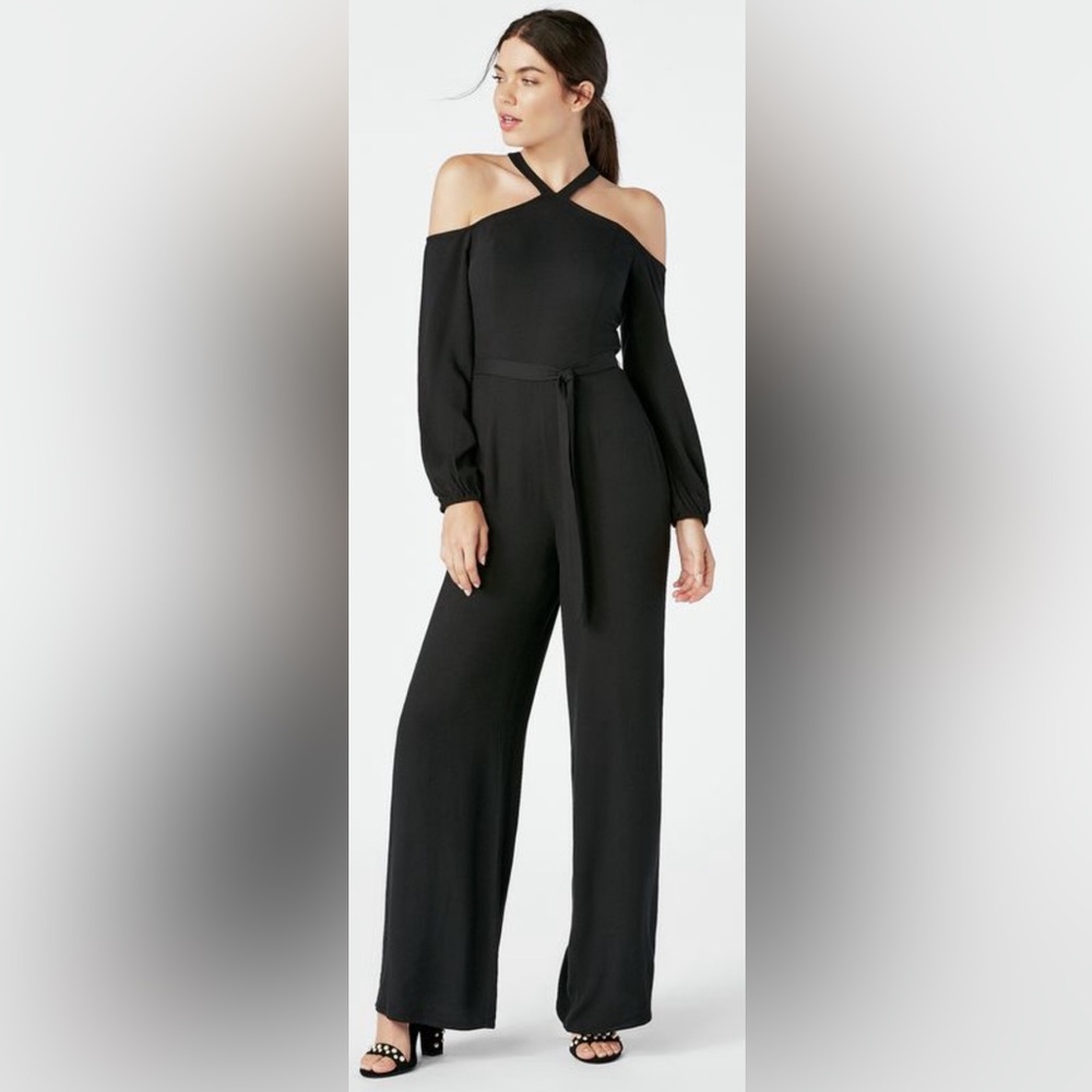 Black cold shoulder jumpsuit. Perfect for a HOLIDAY party!!